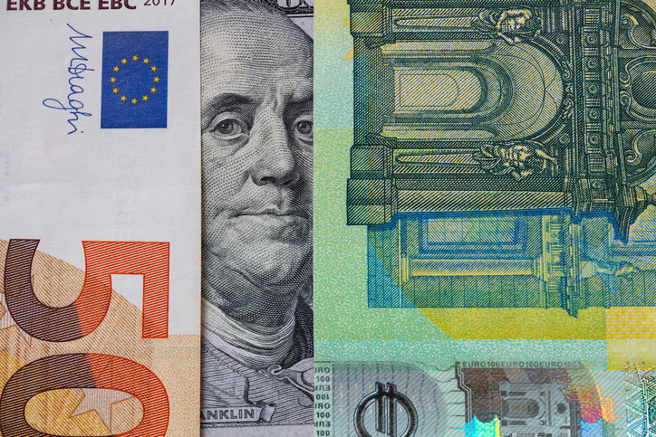 Benjamin Franklin peeking through euro banknotes