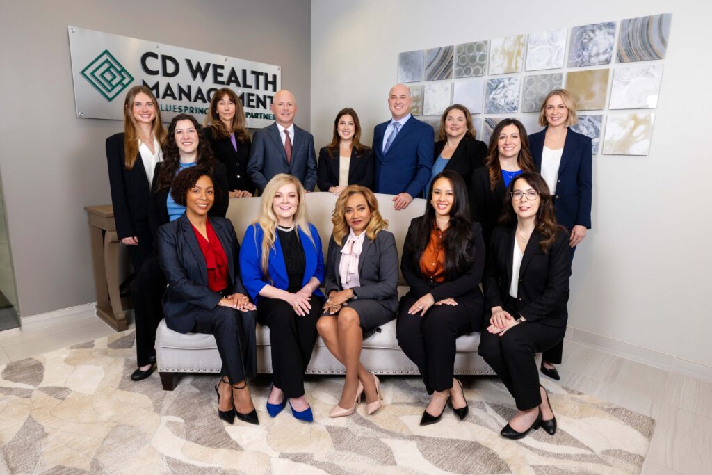 Attractive professionals posing in an office setting.